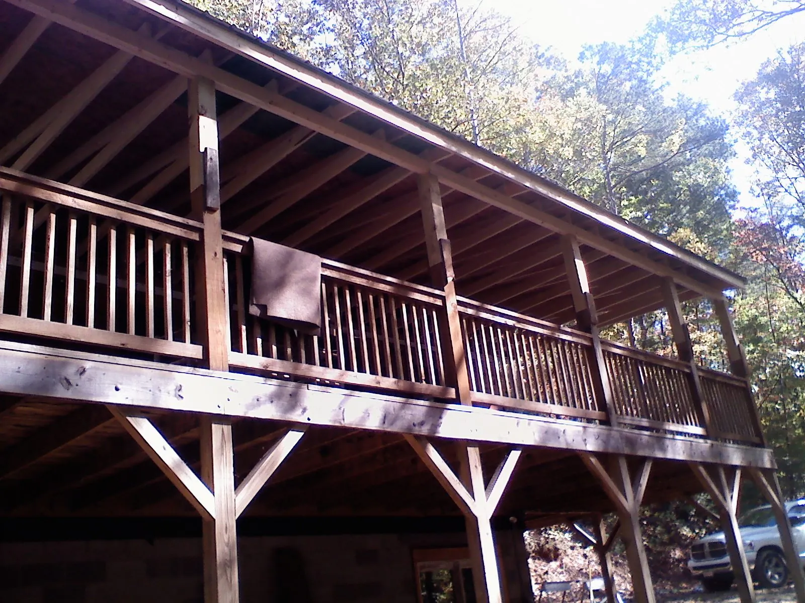 Timber framing under a new elevated porch and deck — Roof Leak Repair in Smithfield by Roofing Brothers
